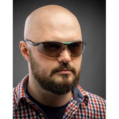 Защитные коричневые очки KRAFTOOL BASIC стекло-моноблок с покрытием устойчивым к истиранию и запотеванию, открытого типа 110319